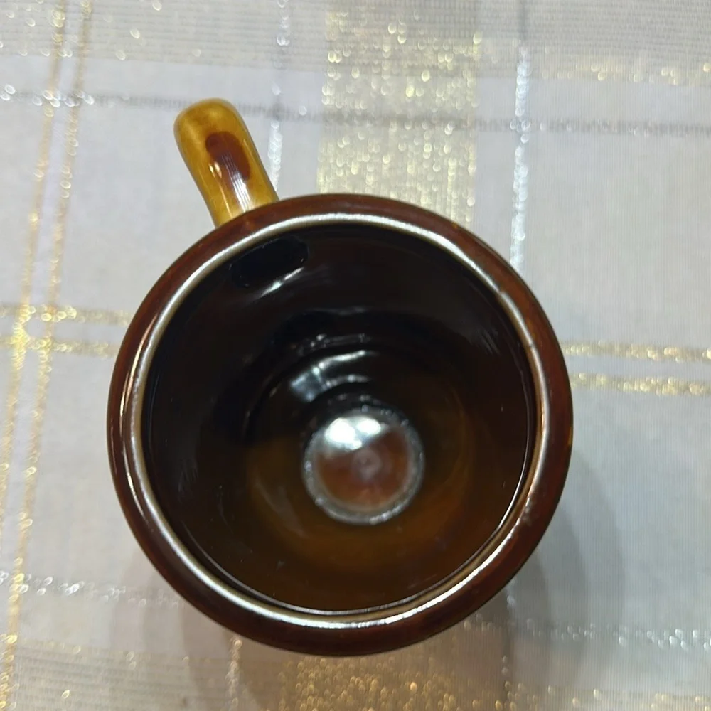 Vintage ceramic souvenir coffee mug with illustration of Montreal Quebec OS